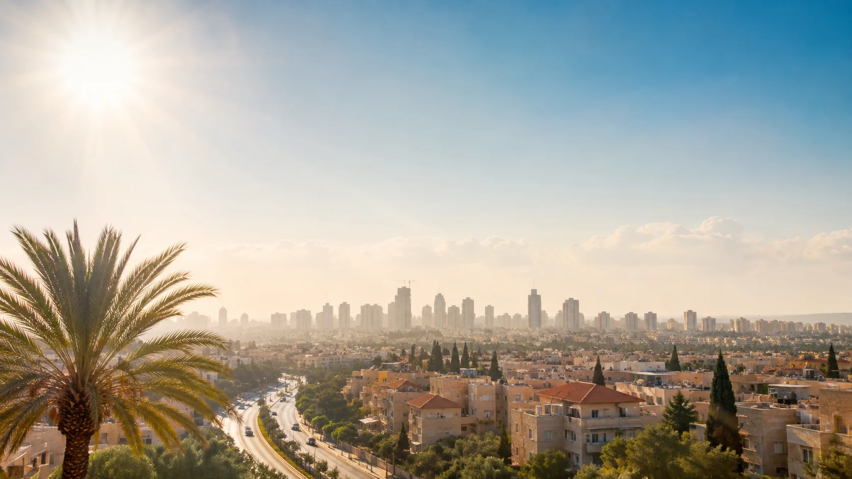 מזג אוויר חם ובהיר מעל אזור עירוני בישראל